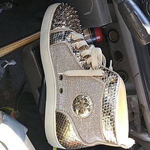 Louboutin spike metallic high top